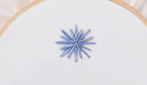 Embroidery 101:  How to Embroider a Star Stitch