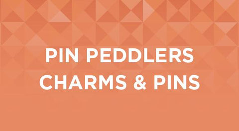 Shop our collection of Pin Peddlers Charms and Pins here.
