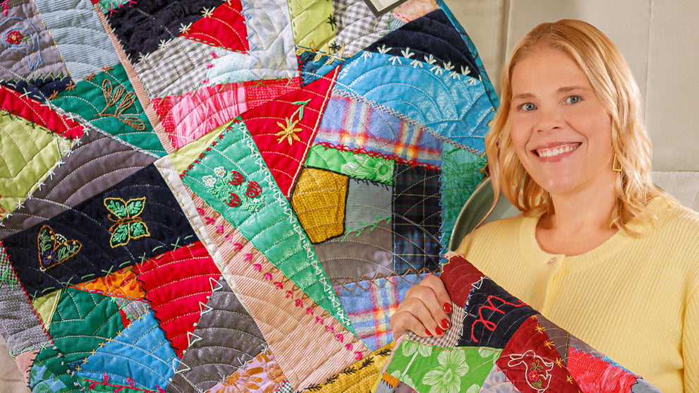 Natalie Doan's Our History in Stitches crazy quilt with embroidered seams