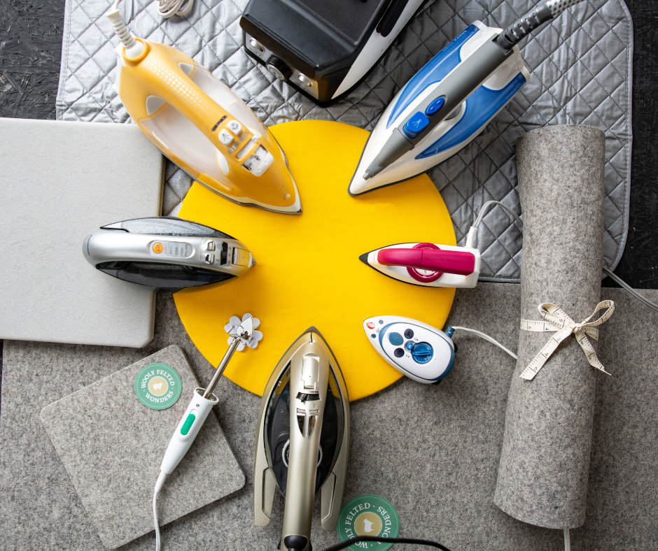 a selection of quilting irons arranged on a variety of pressing mats and surfaces.