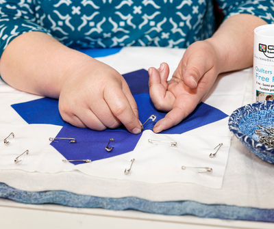 How to Baste a Quilt — Spray, Pin & Board Methods Compared