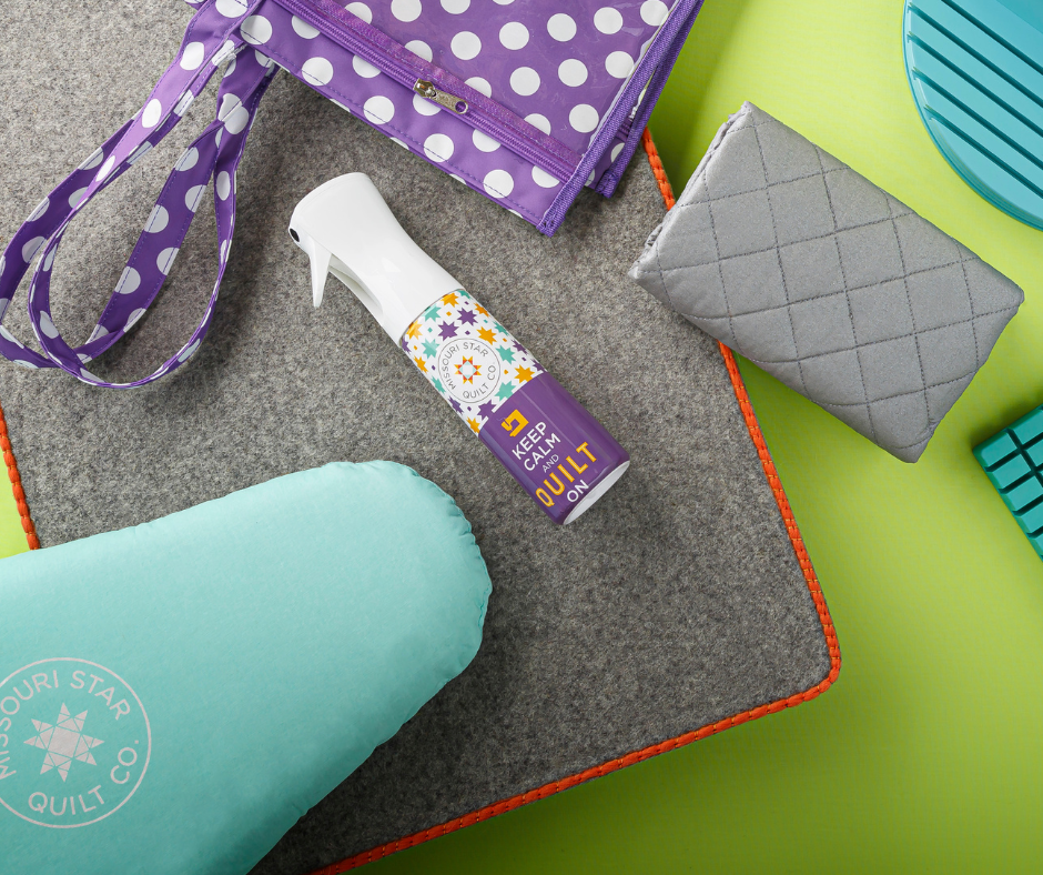 Wool pressing mat, ironing board and big-board cover set up for pressing quilt blocks