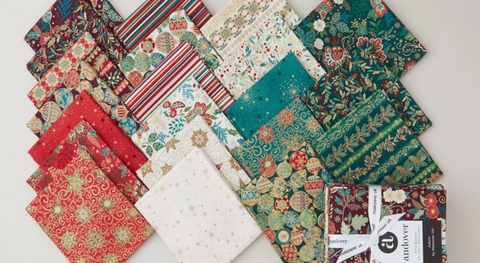 Fat quarter bundle of a bold and detailed holiday fabric collection with seep tones and metallics. 