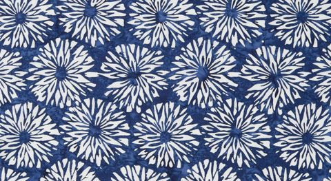 Batik print of large white flowers on a dark blue background from the Kasuri Fabric Collection by Lunn Studios.