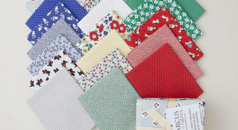 Fat quarters of vintage prints in primary colors from the Aunt Grace Goes Bold fabric collection.