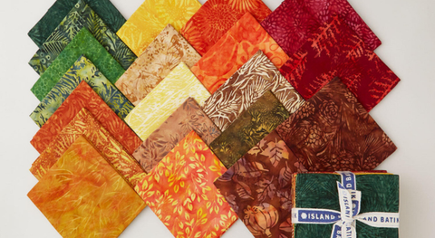 An autumnal themed fat quarter bundle of batiks from the Autumn's Embrace Batiks fabric collection.