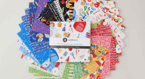 harm pack of cotton quilt fabric with a colorful, school theme.