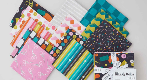 Fat quarter bundle of cotton quilting fabric with a sewing theme in assorted colors. 