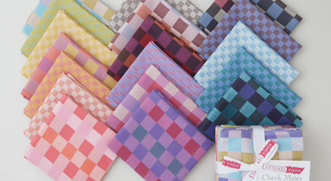 A colorful selection of check fabrics in assorted colors.