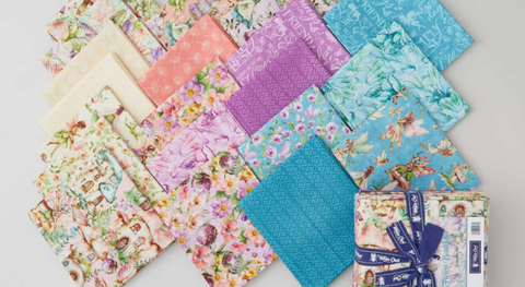 Fat quarter bundle of cotton quilt fabric with a fairy theme.
