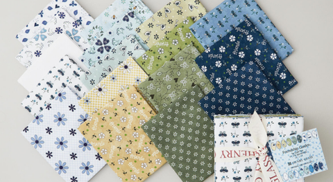 Fat quarter bundle of garden-inspired prints in a blue, green, yellow, and white palette. 