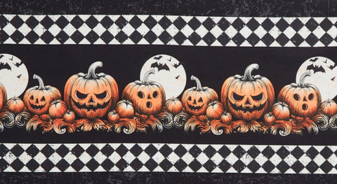 Stripes of solid black and jack-o-lanterns from the Haunted Hollow fabric collection