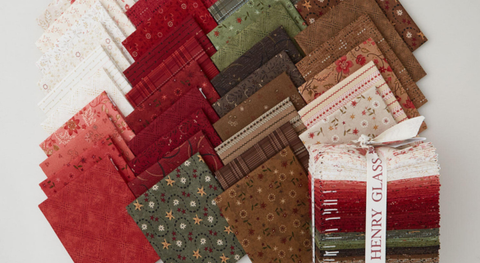 Fat quarter bundle of warm country florals and blenders.