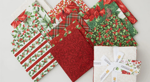 A selection of fat quarter fabrics from the holiday joy fabric collection.