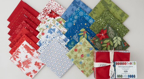 Fat quarter bundle of nature-inspired holiday prints in a red, blue, green, and cream color scheme.