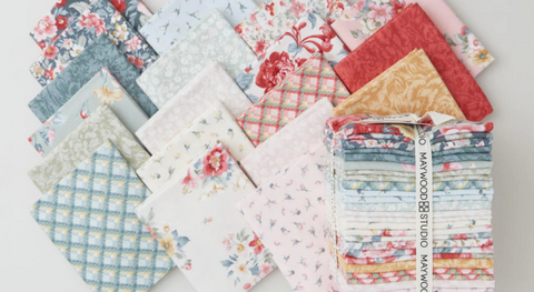 a selection of fat quarter prints from the La Fleur Flannel Fabric collection.