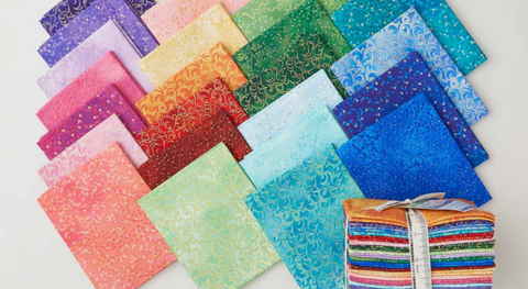 Fat quarter bundle of assorted colors with metallic dots and swirls. 