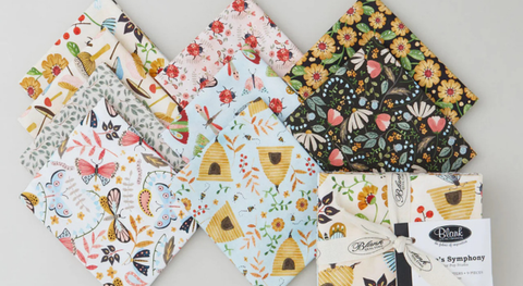 a selection of fat quarter fabrics from the Nature's Symphony fabric collection.