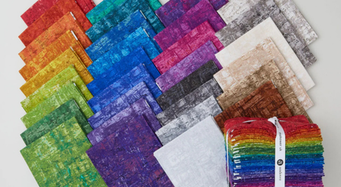 a selection of fat quarter fabrics from the nitty gritty fabric collection  by Jordan Fabrics for Andover.