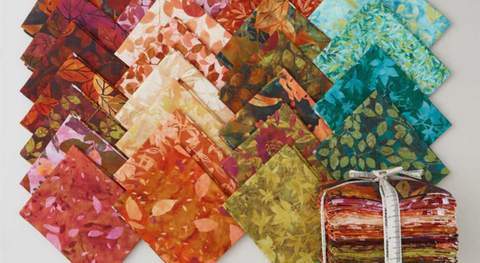 a selection of colorful fat quarters from the potpourri fabric collection.