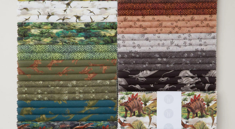 10" Squares of dinosaur fabric prints from the Prehistoric Paradise fabric collection.