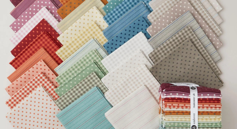 Fat quarter bundle of cotton quilt fabric with dots, checks, and stripes in assorted colors.