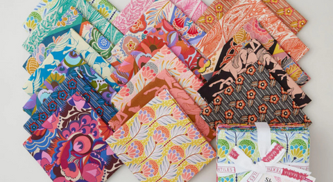 a selection of fat quarter fabrics from the Shooting Star fabric collection.