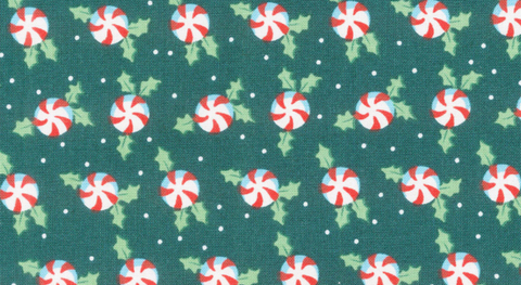 Holly and peppermints on a green background from the So Much Joy fabric collection.