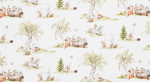 Squirrels, rabbits, chipmunks, and foxes in woodland vignettes tossed on a cream quilting cotton with trees and logs.