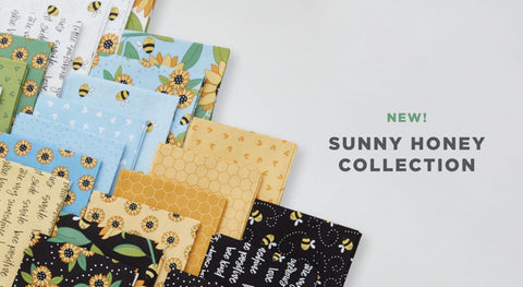 A selection of fat quarter fabrics from the Sunny Honey fabric collection by Amy Latta.