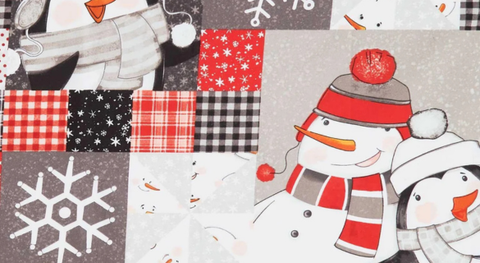 Cotton flannel with a cheater print of winter motifs in a red, black, gray, and white palette.