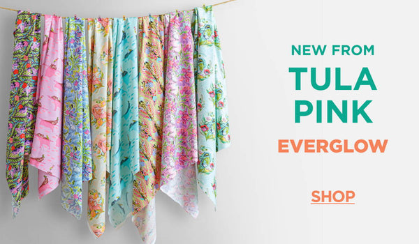 Shop the tula pink everglow fabric collection here.