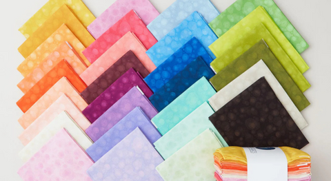 a selection of fat quarter fabrics from the Watermark Fabric Collection.