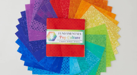 5" Squares of assorted red, yellow, orange, blue, green, and purple small-scale prints fanned out in a pleasing manner.