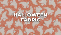 Halloween fabric by the yard – friendly ghost print in pumpkin orange