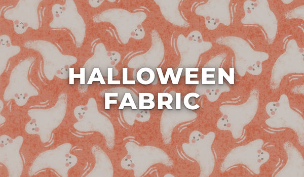 Halloween fabric by the yard – friendly ghost print in pumpkin orange
