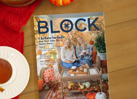 Stack of BLOCK magazines and a sewing machine