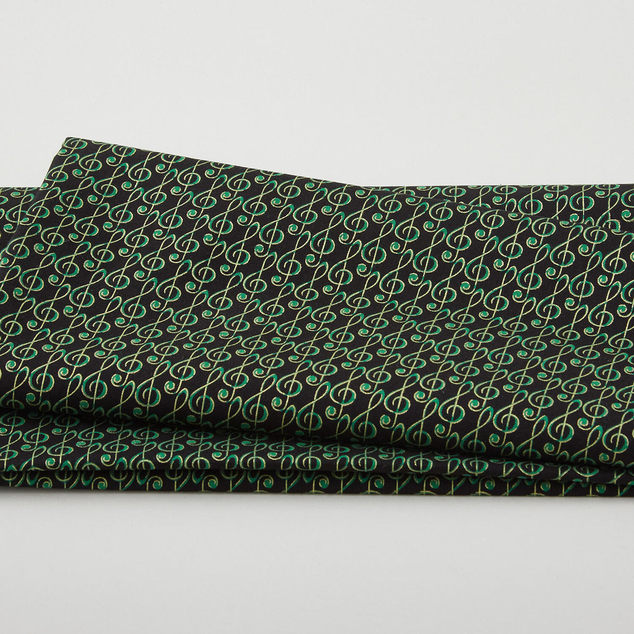 Christmas Musical - Musical G-Clef Black/Green Metallic 2 Yard Cut