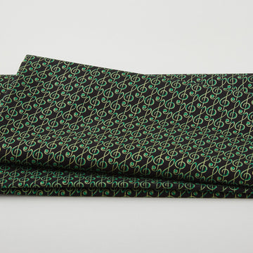 Christmas Musical - Musical G-Clef Black/Green Metallic 2 Yard Cut