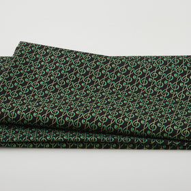 Christmas Musical - Musical G-Clef Black/Green Metallic 2 Yard Cut
