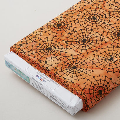 M2 Spiders on Orange Batik 8 Yard Bolt