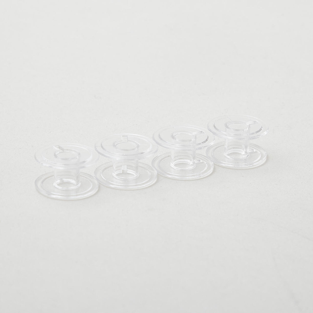 Plastic Bobbins - Class 15 (4 ct)