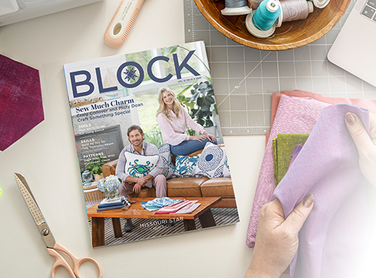 Stack of BLOCK magazines and a sewing machine