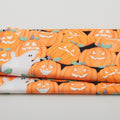 Nights of Old Salem - Packed Pumpkins Glow Orange One Yard Cut Primary Image