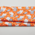Nights of Old Salem - Tossed Ghosts Glow Orange One Yard Cut Primary Image