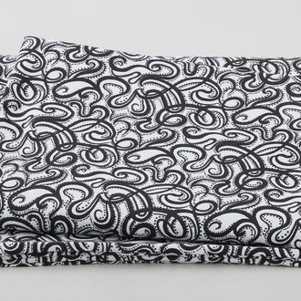 Infinity - Flowing Ribbon With Dots Black 108" Wide 3 Yard Cut