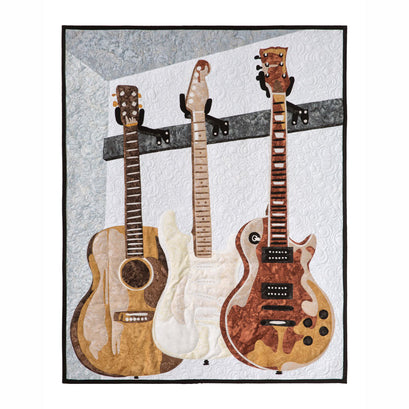 Man Sewing Unstrung Heroes Guitar Kit