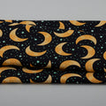 Spooky Friends - Tossed Moons & Stars Glow Black One Yard Cut Alternative View #1