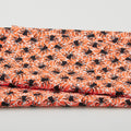 Spooky Friends - Tossed Spiders Glow Orange One Yard Cut Primary Image