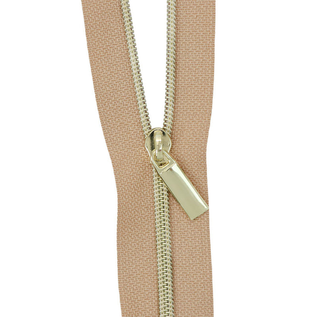 Sallie Tomato #3 Nylon Zippers & Pulls - Natural with Gold Coil Primary Image